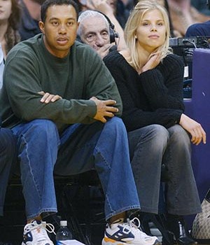 ©2003 RAMEY PHOTO 310-828-3445Tiger Woods and his girlfriend Elin Nordegren of Sweden sit courtside during the NBA game between the Los Angeles Lakers and the Houston Rockets February 18, 2003 at Staples Center in Los Angeles. Woods, who recently won the Buick Invitational in San Diego, will compete in the Nissan Open in Los Angeles this weekend.JR21803 (Mega Agency TagID: MEGAR109578_2[3].jpg) [Photo via Mega Agency]