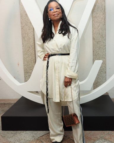 Oprah Winfrey poses at the photocall for Louis Vuitton Cruise Collection 2024 presentation held at Palazzo Borromeo in Isola Bella, Italy on May 24, 2023. Louis Vuitton Cruise Photocall - Isola Bella, Italy - 25 May 2023