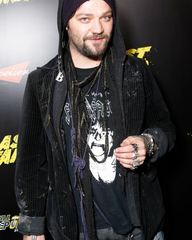 FILE - This Jan. 14, 2013 file photo shows Bam Margera at the LA premiere of "The Last Stand" at Grauman's Chinese Theatre in Los Angeles. Margera, star of "Jackass," put several dozen of his own paintings up for sale Tuesday at a barn on his property in West Chester, outside Philadelphia. The 33-year-old Margera let fans know about the art show in a tweet that day. (Photo by Todd Williamson/Invision/AP, file)