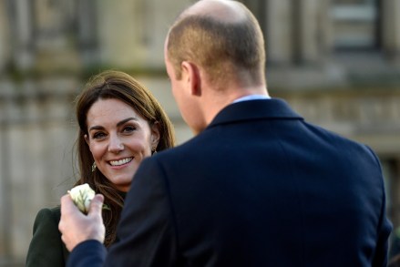 Catherine Duchess of Cambridge smiles as Britain's Prince William holds a rose during their meeting with the members of the public at Centenary Square in Bradford northern England
Royal Rift, Bradford, United Kingdom - 15 Jan 2020