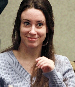 FILE - In this July 7, 2011 file photo, Casey Anthony smiles before the start of her sentencing hearing in Orlando, Fla.  On Tuesday, Oct. 25, 2011, the names of the jurors in the Casey Anthony trial were made public for the first time since they acquitted the Florida mother on charges of murdering her 2-year-old daughter, Caylee.    (AP Photo/Joe Burbank, File)