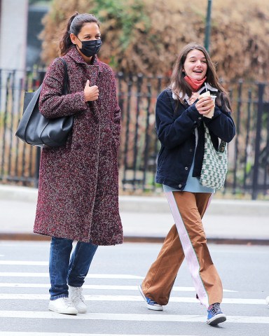 Actress Katie Holmes and daughter Suri enjoying a sunday afternoon together, all smiles and laughs in Soho, New York City, NY, USA on March 20, 2022. Katie is showing off her nose and ear piercing. Photo by Dylan Travis/ABACAPRESS.COMPictured: Katie Holmes,Suri CruiseRef: SPL5297803 200322 NON-EXCLUSIVEPicture by: AbacaPress / SplashNews.comSplash News and PicturesUSA: +1 310-525-5808London: +44 (0)20 8126 1009Berlin: +49 175 3764 166photodesk@splashnews.comUnited Arab Emirates Rights, Australia Rights, Bahrain Rights, Canada Rights, Greece Rights, India Rights, Israel Rights, South Korea Rights, New Zealand Rights, Qatar Rights, Saudi Arabia Rights, Singapore Rights, Thailand Rights, Taiwan Rights, United Kingdom Rights, United States of America Rights