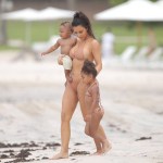 Kim Kardashian enjoyed her summer vacation with baby Saint and North West as they all play in the sand together at Casa Aramara in Punta Mita Mexico  North was joined by her baby brother for his first tropical trip in the water together as a family. Kim was having fun on the ground with the baby as she and her daughter spent some quality time together all in their summer swimwear.Mandetory mention of "Casa Aramara in Punta Mita Mexico"Ref: SPL1336080  180816  Picture by: Splash NewsSplash News and PicturesLos Angeles:310-821-2666New York:212-619-2666London:870-934-2666photodesk@splashnews.com