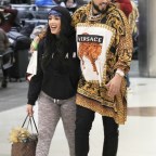 *EXCLUSIVE* French Montana arrives to Miami with a mystery girlfriend