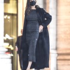 EXCLUSIVE: Angelina Jolie goes location scouting in Rome under heavy rain
