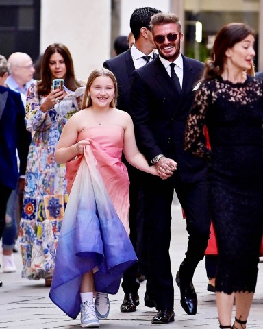 *EXCLUSIVE* Venice, ITALY  - Former England footballer David Beckham looks dapper while pictured with his daughter Harper Seven together with Domenico Dolce going to the Riva event at the Fenice theatre in Venice.  Harper was pictured looking in great spirits with her dad as they laughed and joked together on route to the glitzy event! **SHOT ON 06/11/22**  Pictured: David Beckham ,Harper Seven ,Domenico Dolce  BACKGRID USA 13 JUNE 2022   BYLINE MUST READ: Cobra Team / BACKGRID  USA: +1 310 798 9111 / usasales@backgrid.com  UK: +44 208 344 2007 / uksales@backgrid.com  *UK Clients - Pictures Containing Children Please Pixelate Face Prior To Publication*