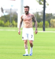 **MANDATORY BYLINE: SPLASH / MEGA** No game? No problem! David Beckham strips off his shirt for a kickaround after his MLS team‚Äôs first home match was canceled amid the Coronavirus crisis. Topless Becks showed off his tattooed torso on the pitch at Inter Miami CF‚Äôs Lockhart Stadium in Fort Lauderdale, Florida, on Saturday (march 14) - the day his new team was set to make their home debut against LA Galaxy. Sons Brooklyn, Romeo and Cruz joined him for the informal footy session. Since launching, Inter Miami has already has a run of bad luck, losing its first two matches, and now having its home debut postponed due to the global pandemic. The MLS, along with NBA and all major US sporting organizations, has suspended all games for 30 days.Pictured: David Beckham
Ref: SPL5156739 140320 NON-EXCLUSIVE
Picture by: Mega / SplashNews.comSplash News and Pictures
USA: +1 310-525-5808
London: +44 (0)20 8126 1009
Berlin: +49 175 3764 166
photodesk@splashnews.comWorld Rights