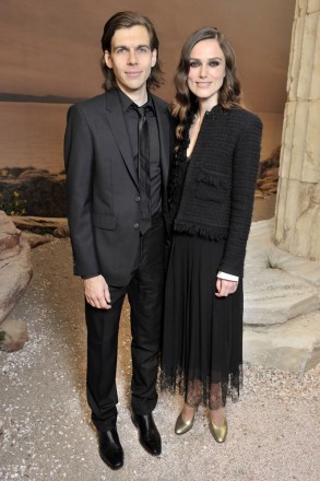 James Righton and Keira Knightley in front of the Chanel Cruise Collection, Grand Palais, Paris, France - 03 May 2017