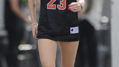 Miley Cyrus' SEXY Bulls Jersey Style — Struts Around In Short-Shorts –  Hollywood Life