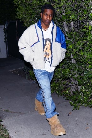 *EXCLUSIVE* Brentwood, CA  - A$AP Rocky is back to making music as he is spotted at the studio just a few weeks after the birth of his and Rihanna's son. Fatherhood has provided him with some new inspiration, and he can't wait to turn it into a hit. The multitalented artist wore a Diana Ross T-shirt topped with a Kapital Pillow Peace Faux Sherpa Jacket ($1019) and swapped out his usual bling for a beaded necklace much like a child would string together, which he proudly showed photographers.Pictured: ASAP RockyBACKGRID USA 7 JUNE 2022 USA: +1 310 798 9111 / usasales@backgrid.comUK: +44 208 344 2007 / uksales@backgrid.com*UK Clients - Pictures Containing ChildrenPlease Pixelate Face Prior To Publication*