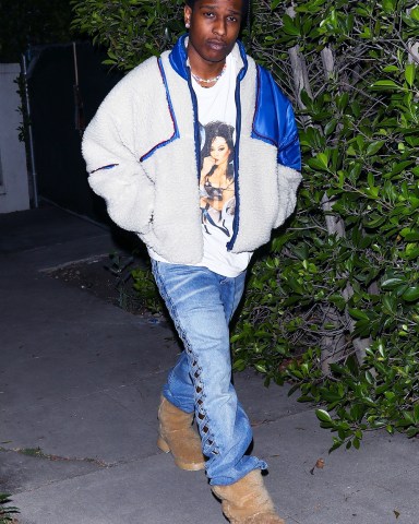 *EXCLUSIVE* Brentwood, CA  - A$AP Rocky is back to making music as he is spotted at the studio just a few weeks after the birth of his and Rihanna's son. Fatherhood has provided him with some new inspiration, and he can't wait to turn it into a hit. The multitalented artist wore a Diana Ross T-shirt topped with a Kapital Pillow Peace Faux Sherpa Jacket ($1019) and swapped out his usual bling for a beaded necklace much like a child would string together, which he proudly showed photographers.Pictured: ASAP RockyBACKGRID USA 7 JUNE 2022 USA: +1 310 798 9111 / usasales@backgrid.comUK: +44 208 344 2007 / uksales@backgrid.com*UK Clients - Pictures Containing ChildrenPlease Pixelate Face Prior To Publication*