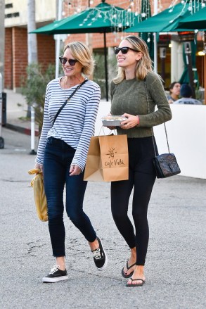 Pacific Palisades, CA - *EXCLUSIVE* - Robin Wright and daughter, Dylan Penn have a girl's day out in Pacific Palisades. The Mother and daughter spent 2 hours at the nail salon and had a snack at Cafe Vida in Pacific Palisades amid speculation that Robin is back to together with ex, and Dylan's dad, Sean Penn after we spotted the two of them together at LAX for the first time in years.Pictured: Robin WrightBACKGRID USA 23 JANUARY 2023 USA: +1 310 798 9111 / usasales@backgrid.comUK: +44 208 344 2007 / uksales@backgrid.com*UK Clients - Pictures Containing ChildrenPlease Pixelate Face Prior To Publication*