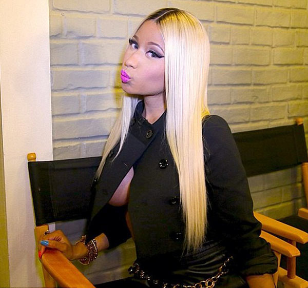 [PICS] Nicki Minaj’s Nip Slip — Singer Wears No Bra Under Jacket