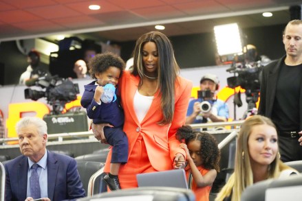 Rap stsr Ciara, cneter, wife of Denver Broncos new starting quarterback Russell Wilson, carries the couple's son, Win. left, while leading daughter Sienna into a news conference, at the team's headquarters in Englewood, Colo
Broncos Wilson Football, Englewood, United States - 16 Mar 2022