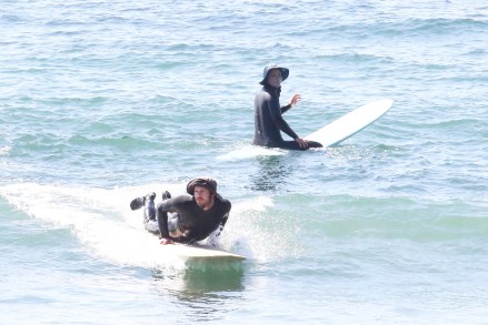 Malibu, CA  - *EXCLUSIVE*  - Actors Adam Brody and Leighton Meester get their surf on in Malibu. The couple suited up in wetsuits and enjoyed their morning riding waves. Leighton carries her surfboard as she walks back to land.Pictured: Adam Brody and Leighton MeesterBACKGRID USA 17 MARCH 2022 USA: +1 310 798 9111 / usasales@backgrid.comUK: +44 208 344 2007 / uksales@backgrid.com*UK Clients - Pictures Containing ChildrenPlease Pixelate Face Prior To Publication*
