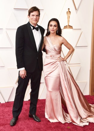 Ashton Kutcher, left, and Mila Kunis arrive at the Oscars, at the Dolby Theatre in Los Angeles
94th Academy Awards - Arrivals, Los Angeles, United States - 27 Mar 2022
