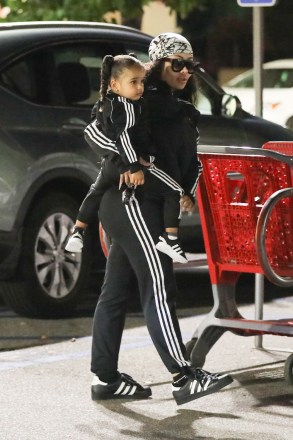 Hollywood, CA - * EXCLUSIVE * - Blac Chyna is out with baby Dream at Target in Hollywood spending some quality time with the adorable child she shares with Rob Kardashian.  Chyna and Dream wore matching tracksuits and sneakers for the outing.  Chyna carried her little girl and placed her inside the shopping cart as they make their way inside the retailer.  Pictured: Blac Chyna, Dream Kardashian BACKGRID USA 23 AUGUST 2019 BYLINE MUST READ: JACK / BACKGRID USA: +1 310 798 9111 / usasales@backgrid.com UK: +44 208 344 2007 / uksales@backgrid.com * UK Clients - Pictures Containing Children Please Pixelate Face Prior To Publication *