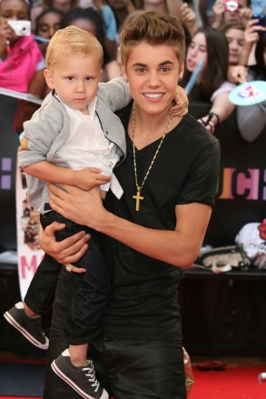 Justin Bieber made the 2012 MuchMusic Video Awards a family affair by bringing his little half-brother Jaxon with him on the red carpet. The Canadian pop star is one of the performers on the MMVAs.Pictured: Justin BieberJaxonRef: SPL403366 170612 NON-EXCLUSIVEPicture by: SplashNews.comSplash News and PicturesUSA: +1 310-525-5808London: +44 (0)20 8126 1009Berlin: +49 175 3764 166photodesk@splashnews.comWorld Rights