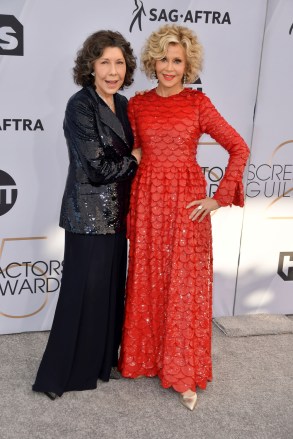 Lily Tomlin and Jane Fonda arrives at the 25th annual Screen Actors Guild Awards at The Shrine Exposition Center on January 27, 2019 in Los Angeles, California. (Photo by Sthanlee Mirador/Sipa USA)(Sipa via AP Images)