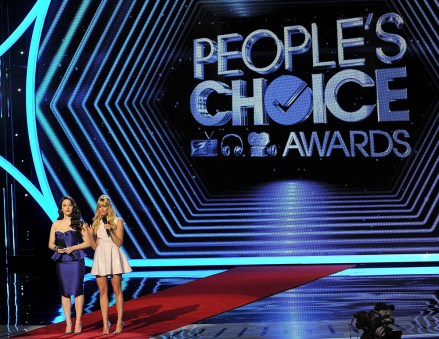 From left, hosts Kat Dennings and Beth Behrs speak onstage at the 40th annual People's Choice Awards at Nokia Theatre L.A. Live, in Los Angeles
2014 People's Choice Awards - Show, Los Angeles, USA - 8 Jan 2014