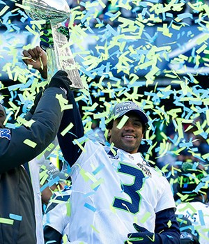 Paul Allen, Russell Wilson Seattle Seahawks owner Paul Allen, left, lifts the Vince Lombardi Trophy with Seahawks quarterback Russell Wilson (3) during a rally, in Seattle. The Seahawks defeated the Denver Broncos on Sunday in NFL football's Super Bowl XLVIII game in East Rutherford, N.JSeahawks Parade Football, Seattle, USA