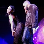 Rihanna goes braless in a sheer bodysuit as she twerks on stage with Drake during a performance of their hit single "Work" as part of the Anti World Tour in Miami