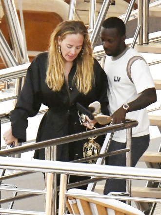 *EXCLUSIVE* SARDINIA, ITALY  - After postponing her concert residency at The Colosseum at Casears Palace a day before it was to start back in January,  Adele announced  today that she has officially rescheduled her shows. The English Singer was seen chilling out on a luxury boat out on the Sardinian coastline of Porto Cervo with her boyfriend Rich Paul on their Italian holiday with friends on Sunday. "Words can't explain how ecstatic I am to finally be able to announce these rescheduled shows. I truly was heartbroken to have to cancel them," the Grammy winner wrote on Instagram. "But after what feels like an eternity of figuring out logistics for the show that I really want to deliver, and knowing it can happen, I'm more excited than ever! Now I know for some of you it was a horrible decision on my part, and I will always be sorry for that, but I promise you it was the right one. To be with you in such an intimate space every week has been what I've most been looking forward to and I'm going to give you the absolute best of me."Her shows will now run from November 18 to March 23.Pictured: Adele and Rich PaulBACKGRID USA 25 JULY 2022 BYLINE MUST READ: FREZZA LA FATA - COBRA TEAM / BACKGRIDUSA: +1 310 798 9111 / usasales@backgrid.comUK: +44 208 344 2007 / uksales@backgrid.com*UK Clients - Pictures Containing ChildrenPlease Pixelate Face Prior To Publication*