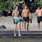 EXCLUSIVE: Justin Bieber takes a walk on the beach in Hawaii after snorkeling