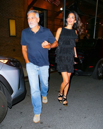 New York, NY - George Clooney and Amal Clooney hold hands as they leave The Greenwich Hotel in New York City after dinner at Locanda Verde.  Pictured: George Clooney, Amal Clooney BACKGRID USA SEPTEMBER 22, 2022 USA: +1 310 798 9111 / usasales@backgrid.com UK: +44 208 344 2007 / uksales@backgrid.com *UK customers to please face children or pictures contains Publication*