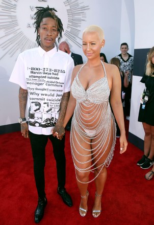 Wiz Khalifa, izquierda, y Amber Rose llegan a los MTV Video Music Awards en The Forum, Inglewood, California2014 MTV Video Music Awards - Red Carpet, Inglewood, EE. UU.