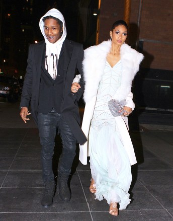 A$ap Rocky and girlfriend Chanel Iman were spotted holding hands as they left Nobu Restaurant in NYC after a romantic dinner date. The couple tried to hide but eventually decided that photos were ok. Rocky took out his wallet and handed a homeless man $20 before walking down the street. Chanel wore a feathered white long gown while Asap wore a hooded jacket and leather pantsPictured: Asap Rocky,Chanel Iman,Asap RockyChanel ImanRef: SPL657666 251113 NON-EXCLUSIVEPicture by: SplashNews.comSplash News and PicturesUSA: +1 310-525-5808London: +44 (0)20 8126 1009Berlin: +49 175 3764 166photodesk@splashnews.comWorld Rights