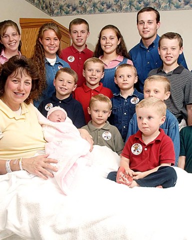 Michelle Duggar, left, is surrounded by her children and husband Jim Bob, second from left, after the birth of her 17th child in Rogers, Ark. From the rubble of TLC's canceled "19 Kids and Counting" now rises "Jill and Jessa: Counting On." The three specials will air Dec. 13, 20 and 27 the TLC network announced . These specials focus on Jill (Duggar) Dillard as she moves to Central America with her family for missionary work and Jessa (Duggar) Seewald starts a family of her own
TV Duggar Sisters Specials, Rogers, USA