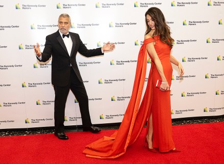 George Clooney and his wife, Amal arrive for the formal Artist's Dinner honoring the recipients of the 45th Annual Kennedy Center Honors at the Department of State in Washington, D.C. on Saturday, December 3, 2022. The 2022 honorees are: actor and filmmaker George Clooney; contemporary Christian and pop singer-songwriter Amy Grant; legendary singer of soul, Gospel, R&B, and pop Gladys Knight; Cuban-born American composer, conductor, and educator Tania Le√≥n; and iconic Irish rock band U2, comprised of band members Bono, The Edge, Adam Clayton, and Larry Mullen Jr. Credit: Ron Sachs / Pool via CNPPictured: George Clooney,Amal ClooneyRef: SPL5507657 031222 NON-EXCLUSIVEPicture by: Ron Sachs/CNP / SplashNews.comSplash News and PicturesUSA: +1 310-525-5808London: +44 (0)20 8126 1009Berlin: +49 175 3764 166photodesk@splashnews.comWorld Rights, No France Rights