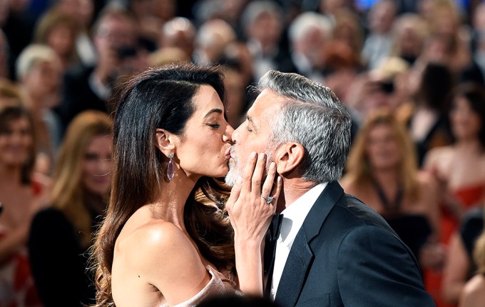 George & Amal Clooney Passionately Kiss