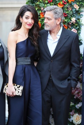 People's Postcode Lottery Gala. George and Amal Clooney, representing the Clooney Foundation for Justice, arrive at the People's Postcode Lottery charity gala at the McEwan Hall in Edinburgh. Picture date: Thursday March 14, 2019. Photo credit should read: Andrew Milligan/PA Wire URN:41764063 (Press Association via AP Images)