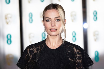 Margot Robbie poses for photographers as she arrives at the BAFTA Film Awards after party at LondonGrosvenor House BAFTA After Party 2020, London, United Kingdom - 02 Feb 2020