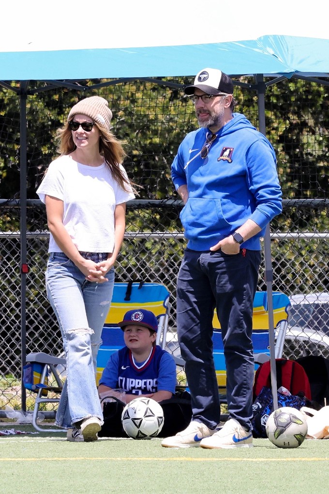 Jason Sudeikis and Olivia Wilde watch their son playing soccer