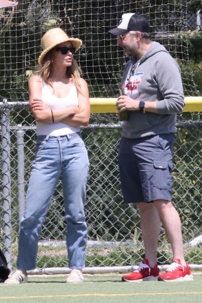 Los Angeles, CA  - Olivia Wilde and Jason Sudeikis put up a united front as they watched their 8-year-old son, Otis', soccer game in Los Angeles.  Pictured: Olivia Wilde, Jason Sudeikis   BACKGRID USA 22 APRIL 2023   USA: +1 310 798 9111 / usasales@backgrid.com  UK: +44 208 344 2007 / uksales@backgrid.com  *UK Clients - Pictures Containing Children Please Pixelate Face Prior To Publication*