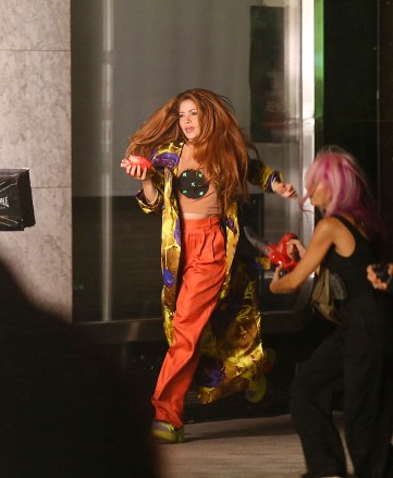 Shakira crying with a heart in her hand full of blood and a chroma key on her chest runs down a street in the center of Manresa a city of Barcelona while filming her new music video "Monotonia" with urban music singer Ozuna in the early hours of September 11 in Manresa, Barcelona, Spain. 11 Sep 2022 Pictured: Shakira. Photo credit: Elkin Cabarcas / MEGA TheMegaAgency.com +1 888 505 6342 (Mega Agency TagID: MEGA894671_001.jpg) [Photo via Mega Agency]