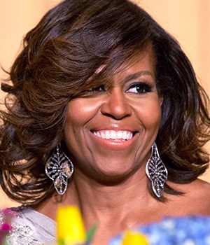 Michelle Obama First lady Michelle Obama laughs while listening to President Obama's speech during the White House Correspondents' Association (WHCA) Dinner at the Washington Hilton Hotel, in WashingtonObama Correspondents, Washington, USA