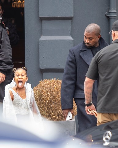 London, UNITED KINGDOM - North West pokes her tongue out to photographers in North London as they leave a Sushi restaurant . Kanye found the incident amusing and covered her mouth laughing!Pictured: North West, Kanye WestBACKGRID USA 10 OCTOBER 2020 BYLINE MUST READ: MJ Pictures / BACKGRIDUSA: +1 310 798 9111 / usasales@backgrid.comUK: +44 208 344 2007 / uksales@backgrid.com*UK Clients - Pictures Containing ChildrenPlease Pixelate Face Prior To Publication*