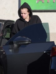 Los Angeles, CA  - *EXCLUSIVE*  - Angelina Jolie and Brad Pitt's daughter, Shiloh Jolie-Pitt, keeps a low profile in a black hoodie and matching sweatpants for a quick 7-11 pitstop where she picks up Twizzlers.

Pictured: Shiloh Jolie-Pitt

BACKGRID USA 21 NOVEMBER 2022 

USA: +1 310 798 9111 / usasales@backgrid.com

UK: +44 208 344 2007 / uksales@backgrid.com

*UK Clients - Pictures Containing Children
Please Pixelate Face Prior To Publication*