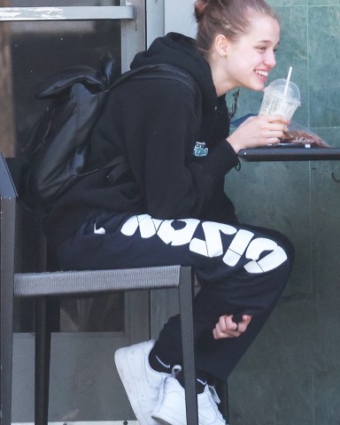 Studio City, CA  - *EXCLUSIVE*  - Shiloh Jolie-Pitt enjoys some fresh air while out with a friend getting coffee.  Pictured: Shiloh Jolie-Pitt   BACKGRID USA 1 MAY 2022   BYLINE MUST READ: Terma / BACKGRID  USA: +1 310 798 9111 / usasales@backgrid.com  UK: +44 208 344 2007 / uksales@backgrid.com  *UK Clients - Pictures Containing Children Please Pixelate Face Prior To Publication*