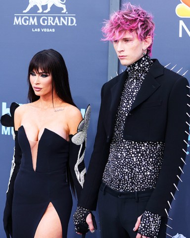 American actress Megan Fox and boyfriend/American rapper Machine Gun Kelly (Colson Baker) arrive at the 2022 Billboard Music Awards held at the MGM Grand Garden Arena on May 15, 2022 in Las Vegas, Nevada, United States.
2022 Billboard Music Awards - Arrivals, Mgm Grand Garden Arena, Las Vegas, Nevada, United States - 16 May 2022