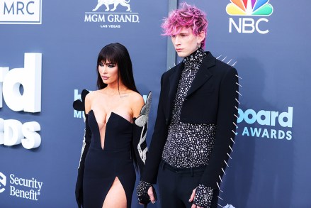 American actress Megan Fox and boyfriend/American rapper Machine Gun Kelly (Colson Baker) arrive at the 2022 Billboard Music Awards held at the MGM Grand Garden Arena on May 15, 2022 in Las Vegas, Nevada, United States.
2022 Billboard Music Awards - Arrivals, Mgm Grand Garden Arena, Las Vegas, Nevada, United States - 16 May 2022