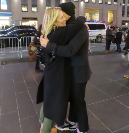 Chelsea Handler kisses Jo Koy outside of Radio City Pictured: Chelsea Handler,Jo Koy Ref: SPL5280371 131221 NON-EXCLUSIVE Picture by: Rick Davis / SplashNews.com Splash News and Pictures USA: +1 310-525-5808 London: +44 ( 0)20 8126 1009 Berlin: +49 175 3764 166 photodesk@splashnews.com World Rights, No Italy Rights, No Romania Rights