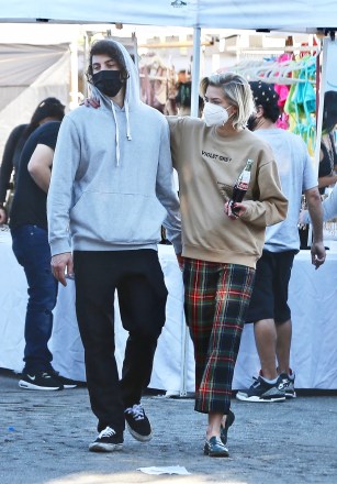 West Hollywood, CA  - *EXCLUSIVE* Jaime King sips on a Coca-Cola while smoking a cigarette as she enjoys her afternoon with her new boyfriend, Sennett Devermont at the Flea Market in West Hollywood.Pictured: Jaime King, Sennett DevermontBACKGRID USA 20 DECEMBER 2020 USA: +1 310 798 9111 / usasales@backgrid.comUK: +44 208 344 2007 / uksales@backgrid.com*UK Clients - Pictures Containing ChildrenPlease Pixelate Face Prior To Publication*