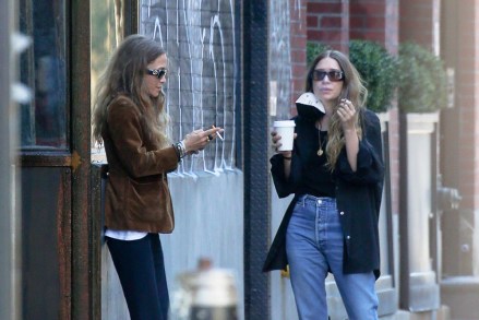 *EXCLUSIVE* New York, NY  - Sisters Mary-Kate Olsen and Ashley Olsen seen taking a break while outside the office building in NYC. Ashley was seen wearing a single gold band on THAT finger as she stepped out for a cig with her twin sister.Ashley has been dating artist Louis Eisner whom she has been linked to for a number of years. The couple were first spotted together in October 2017. WE spotted the fashion mogul on August 26, tucking her left hand into her arm as she spotted photographers in NYC. Ashley’s twin, Mary-Kate was married to Olivier Sarkozy since 2015 but requested an emergency divorce in May 2020, during the coronavirus pandemic. That divorce was finalized in January.Pictured: Mary-Kate Olsen, Ashley OlsenBACKGRID USA 8 SEPTEMBER 2021 BYLINE MUST READ: Fernando Ramales / BACKGRIDUSA: +1 310 798 9111 / usasales@backgrid.comUK: +44 208 344 2007 / uksales@backgrid.com*UK Clients - Pictures Containing ChildrenPlease Pixelate Face Prior To Publication*