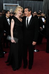 Melanie Griffith and Antonio Banderas and arrives before the 84th Academy Awards on Sunday, Feb. 26, 2012, in the Hollywood section of Los Angeles. (AP Photo/Matt Sayles)
