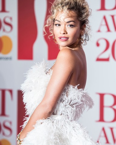 Rita Ora poses for photographers upon arrival at the Brit Awards in London, Wednesday, Feb. 21, 2018. (Photo by Vianney Le Caer/Invision/AP)